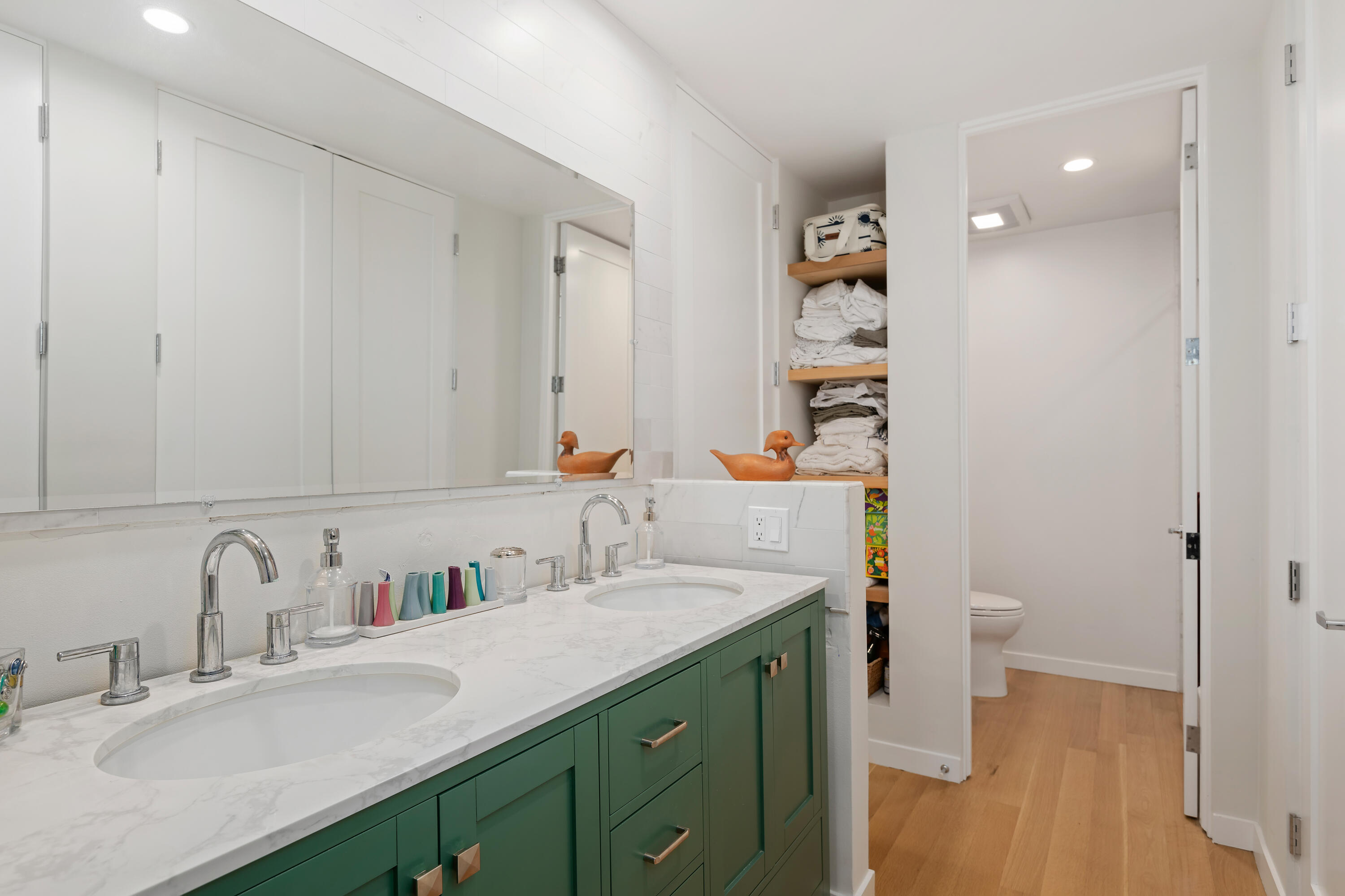 1220 Coast Village Road, Unit 303 Santa Barbara, CA 93108 - Photo 20 of 29 a bathroom with a sink and a mirror