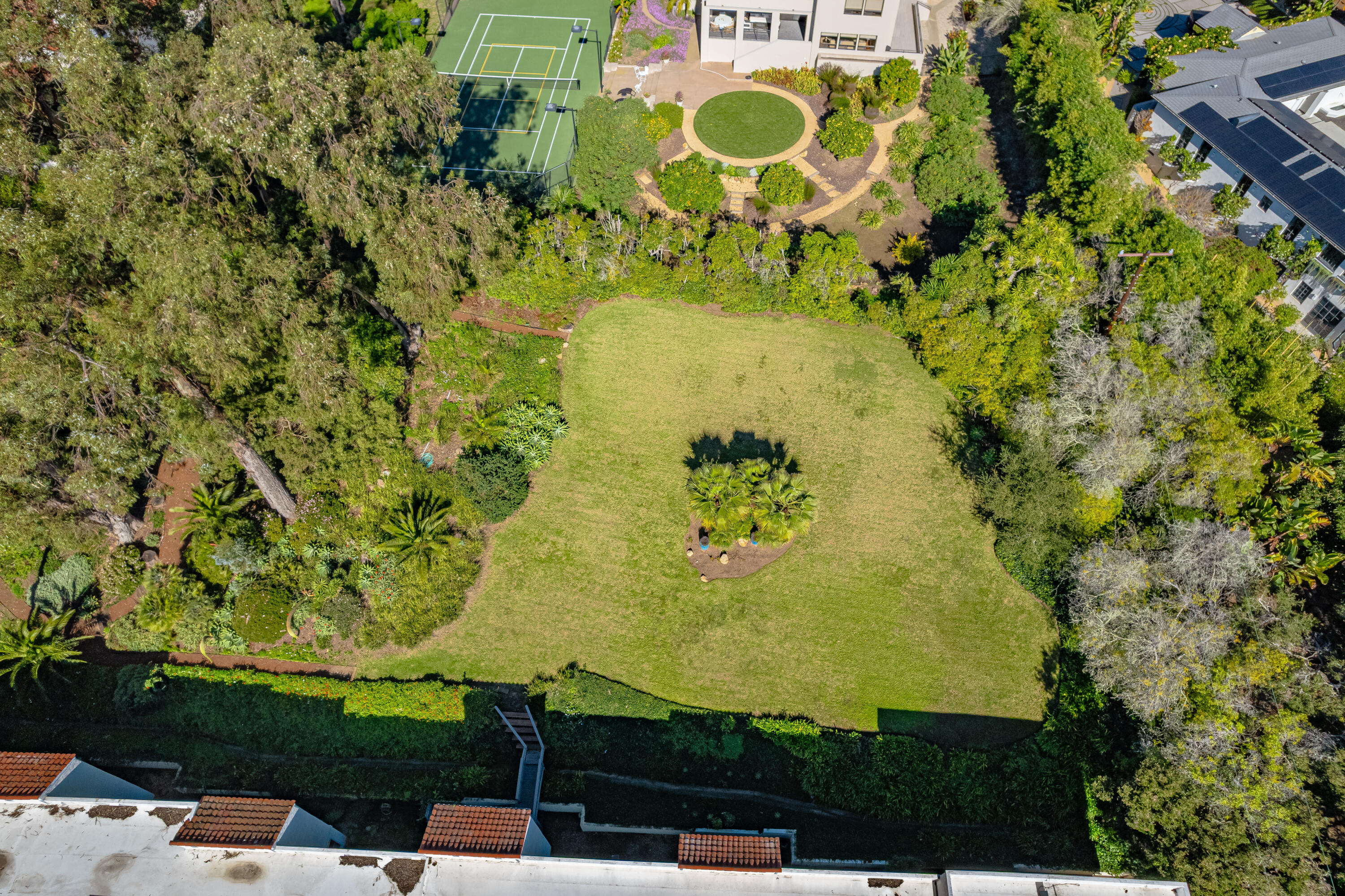 1220 Coast Village Road, Unit 303 Santa Barbara, CA 93108 - Photo 26 of 29 a view of a garden with a lake