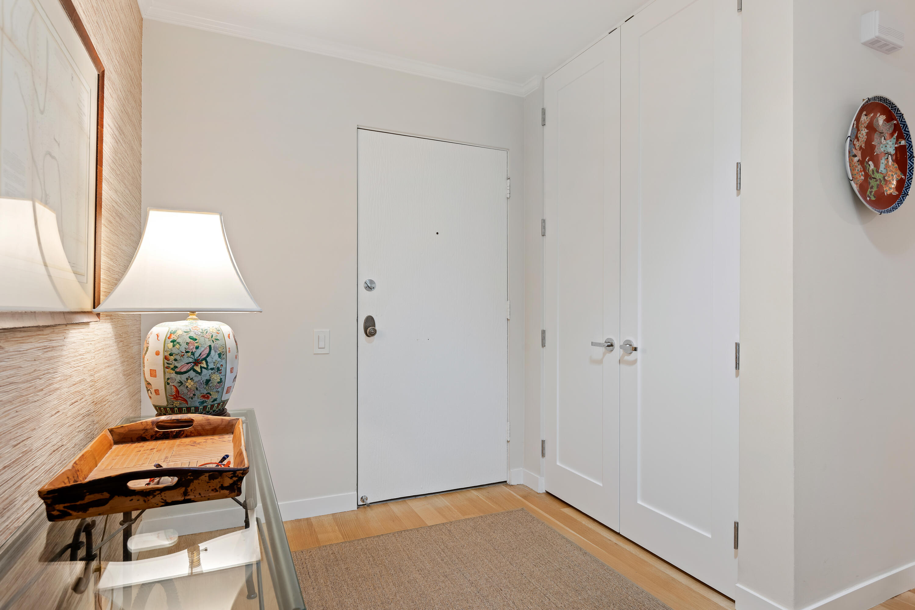 1220 Coast Village Road, Unit 303 Santa Barbara, CA 93108 - Photo 5 of 29 a room with a door and a window