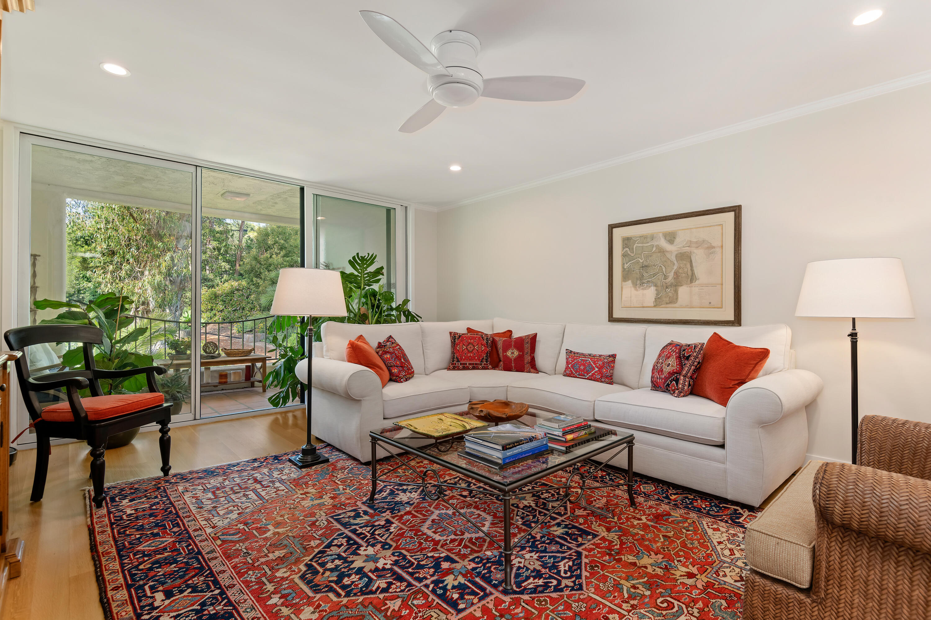 1220 Coast Village Road, Unit 303 Santa Barbara, CA 93108 - Photo 9 of 29 a living room with furniture and a large window