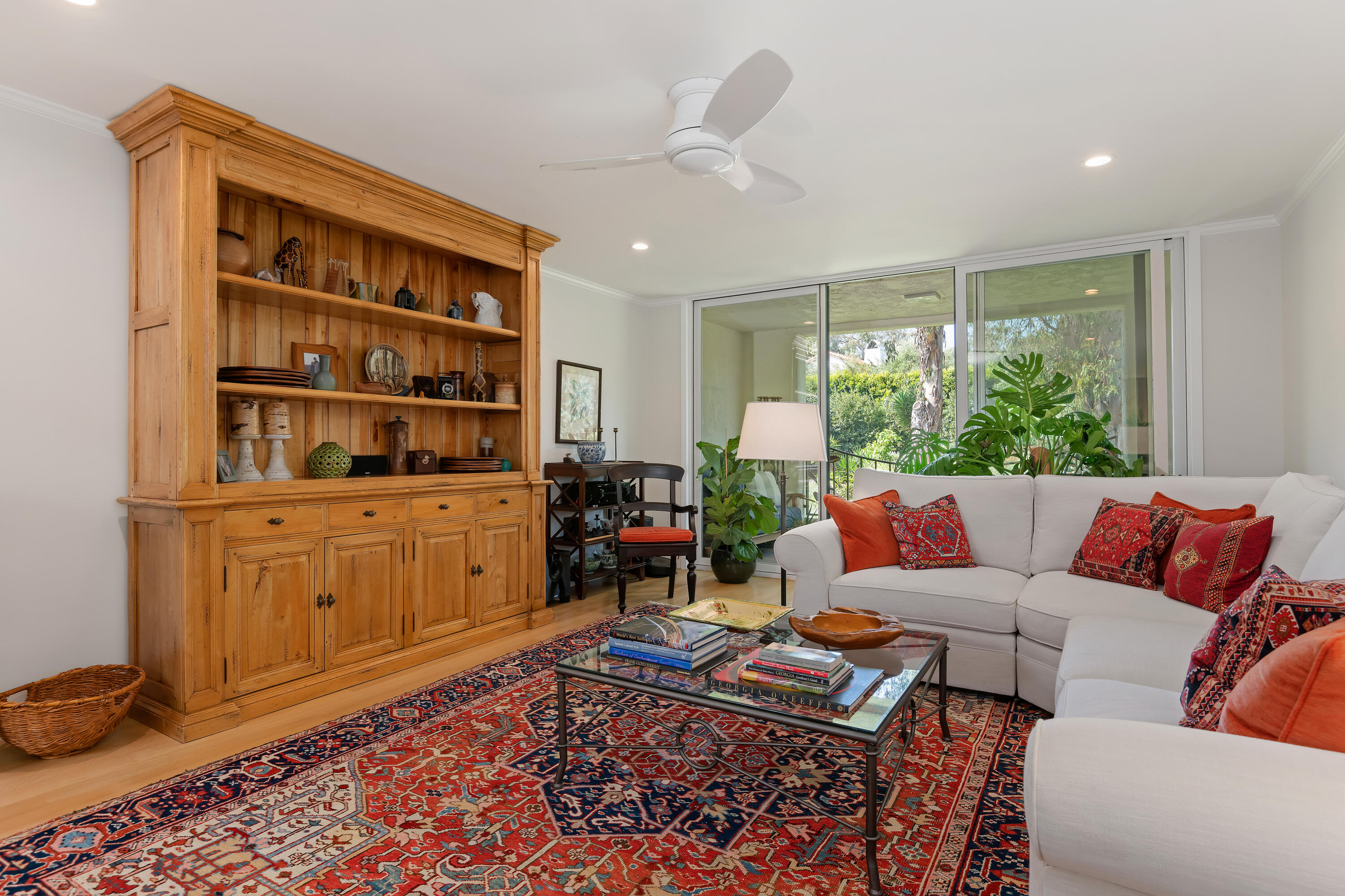 1220 Coast Village Road, Unit 303 Santa Barbara, CA 93108 - Photo 10 of 29 a living room with furniture a rug and a window
