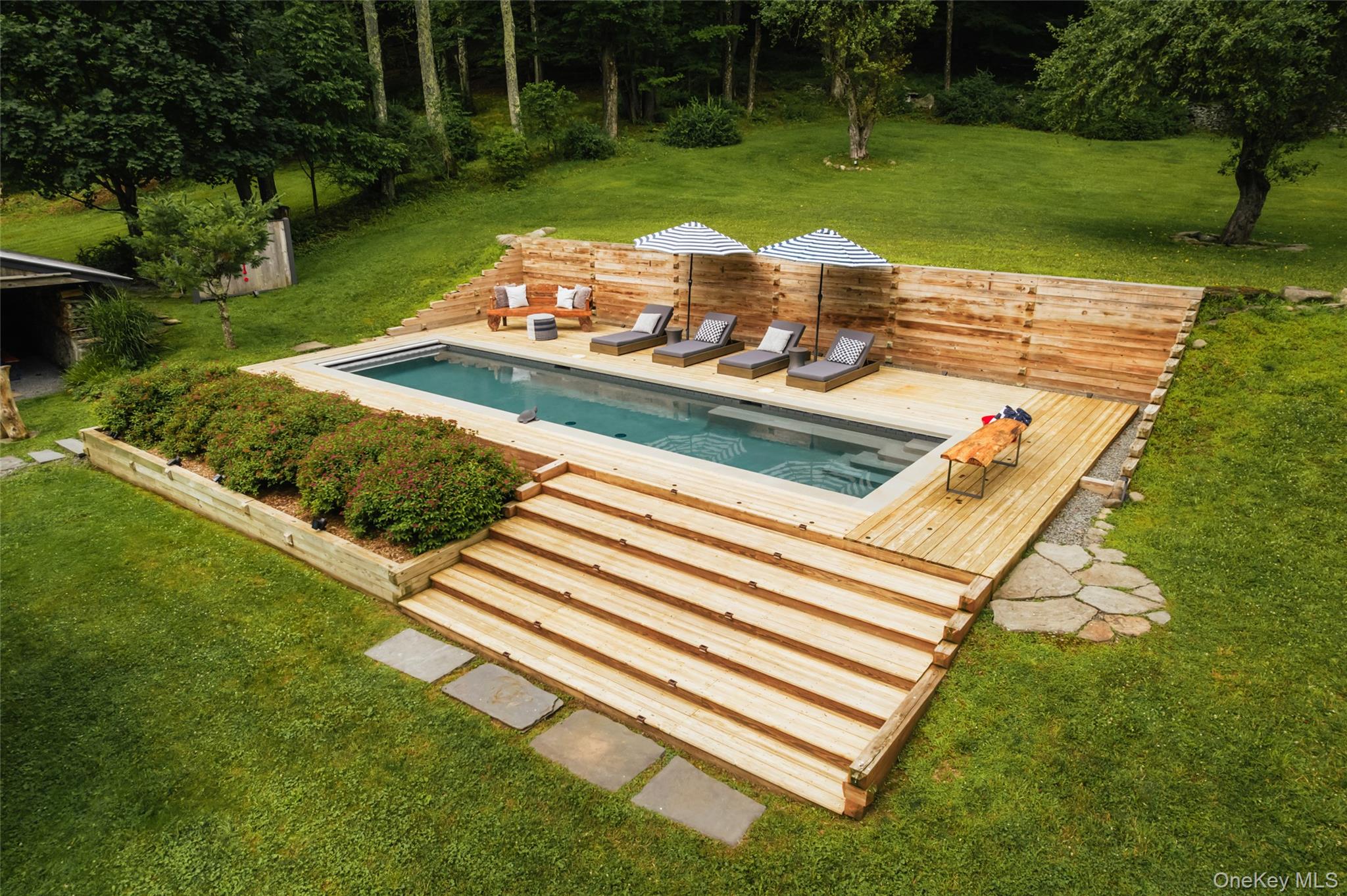 1680 Gulf Road North Branch, NY 12766 - Photo 33 of 45 View of pool featuring a wooden deck and 18 ft wide stairs