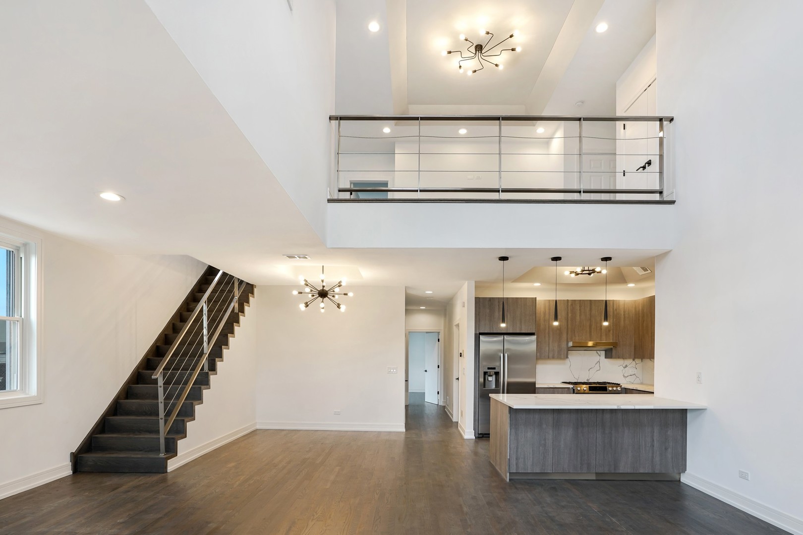 822 West Hubbard Street, Unit 5 Chicago, IL 60642 - Photo 2 of 31 a view of a hallway with wooden floor and staircase