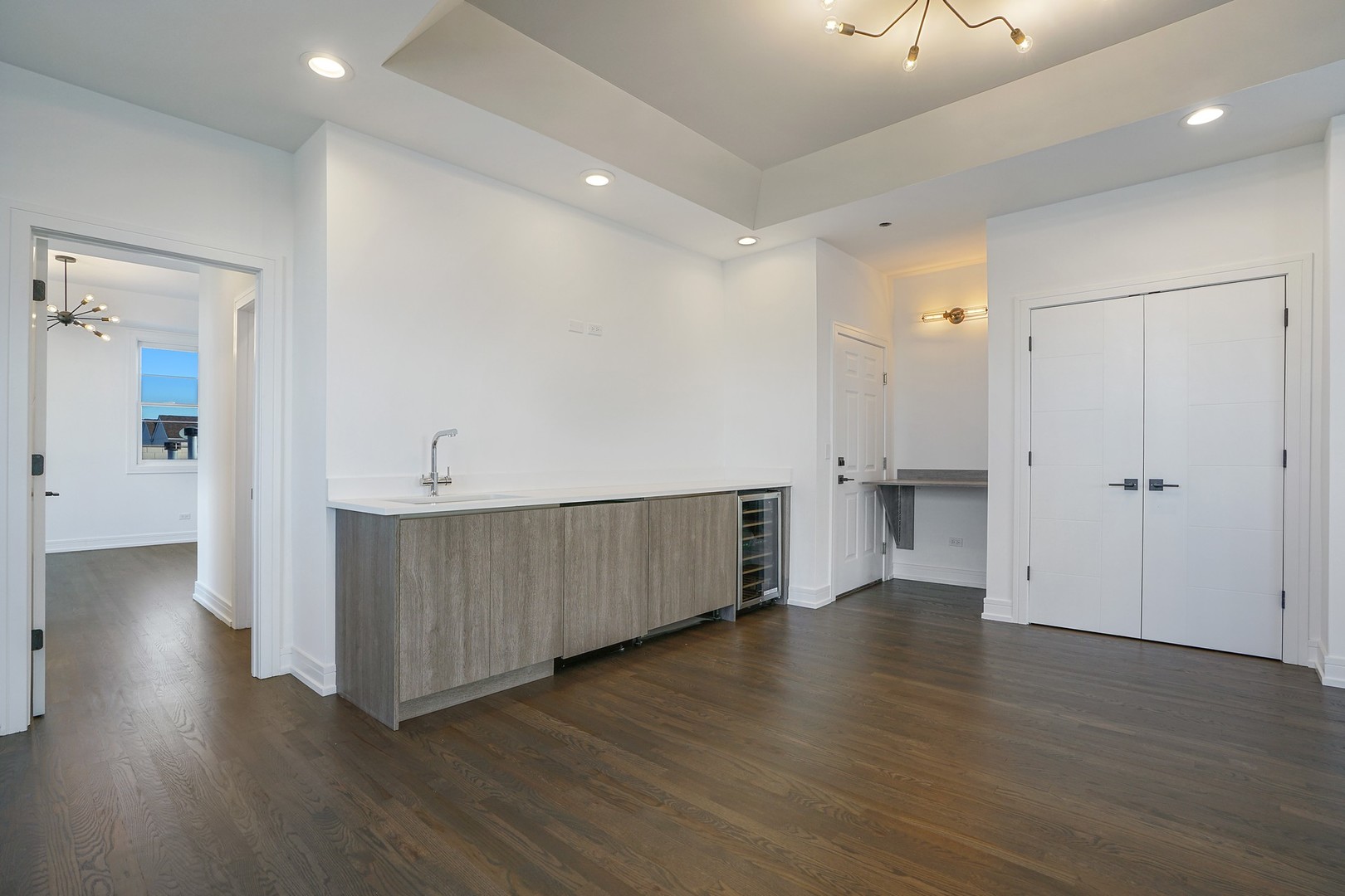 822 West Hubbard Street, Unit 5 Chicago, IL 60642 - Photo 11 of 31 an empty room with wooden floor