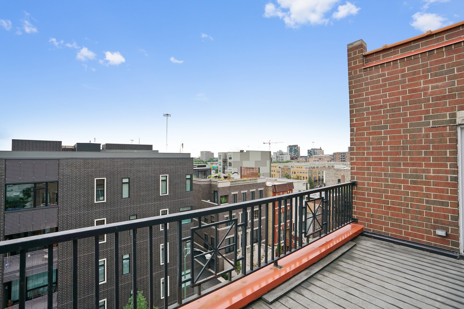 822 West Hubbard Street, Unit 5 Chicago, IL 60642 - Photo 22 of 31 a view of city from a balcony