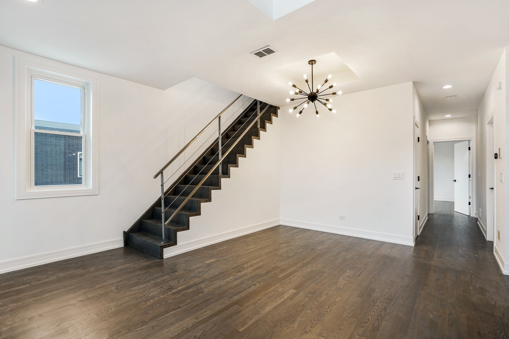 822 West Hubbard Street, Unit 5 Chicago, IL 60642 - Photo 10 of 31 a view of entryway and hall with wooden floor