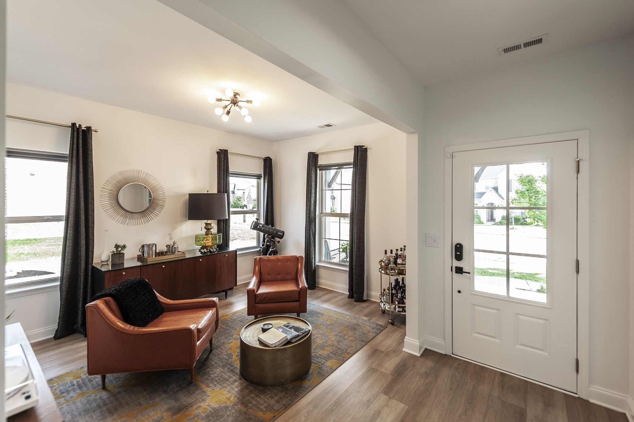 400 Quarry Road Gallatin, TN 37066 - Photo 12 of 81 a living room with furniture and a wooden floor