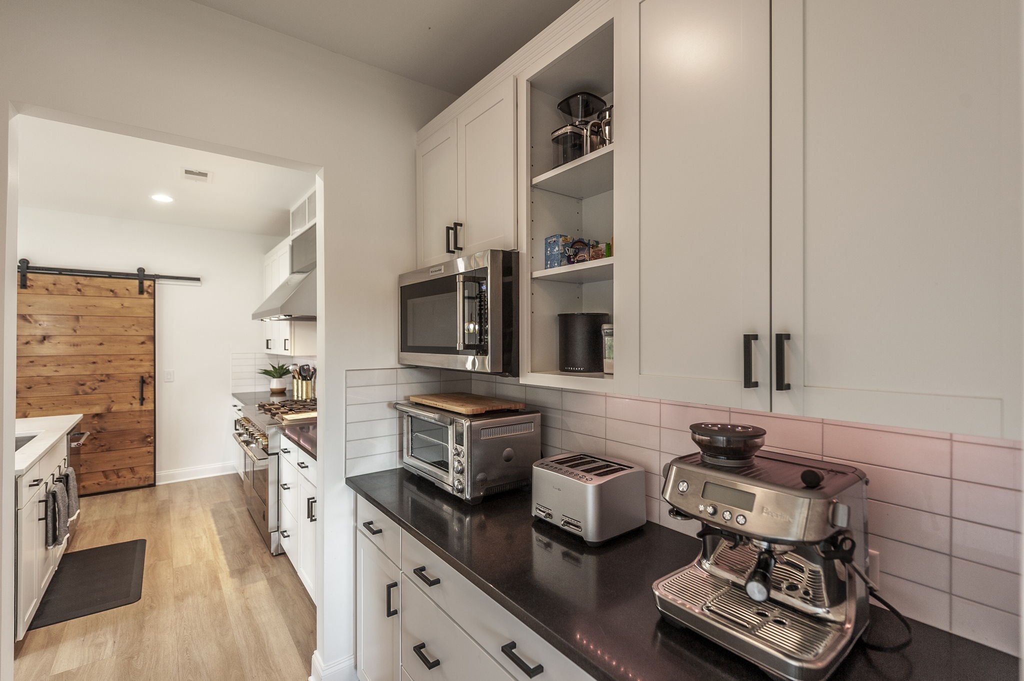 400 Quarry Road Gallatin, TN 37066 - Photo 23 of 81 a kitchen with stainless steel appliances a sink stove and cabinets