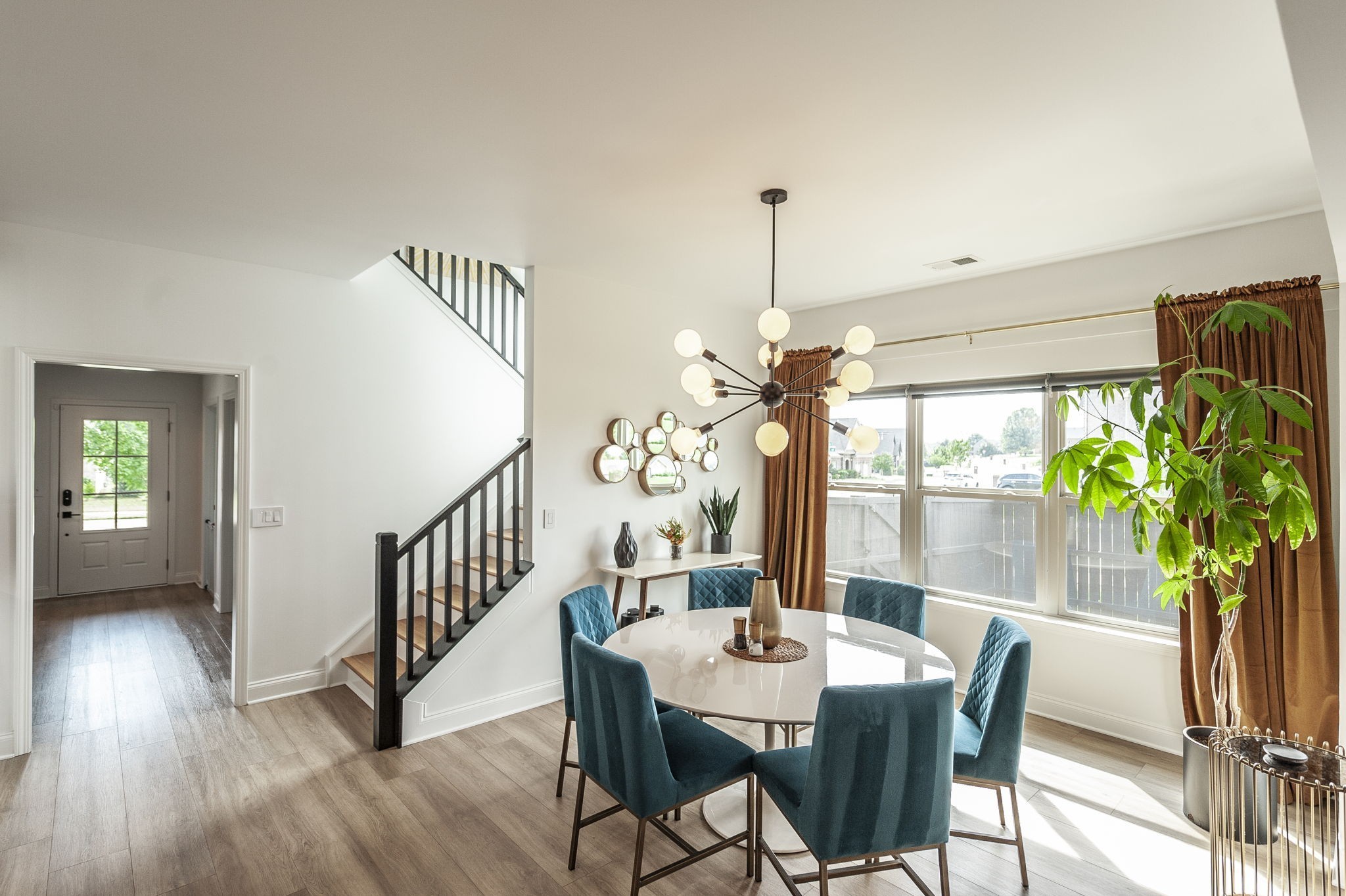400 Quarry Road Gallatin, TN 37066 - Photo 30 of 81 a view of a dining room with furniture window and wooden floor