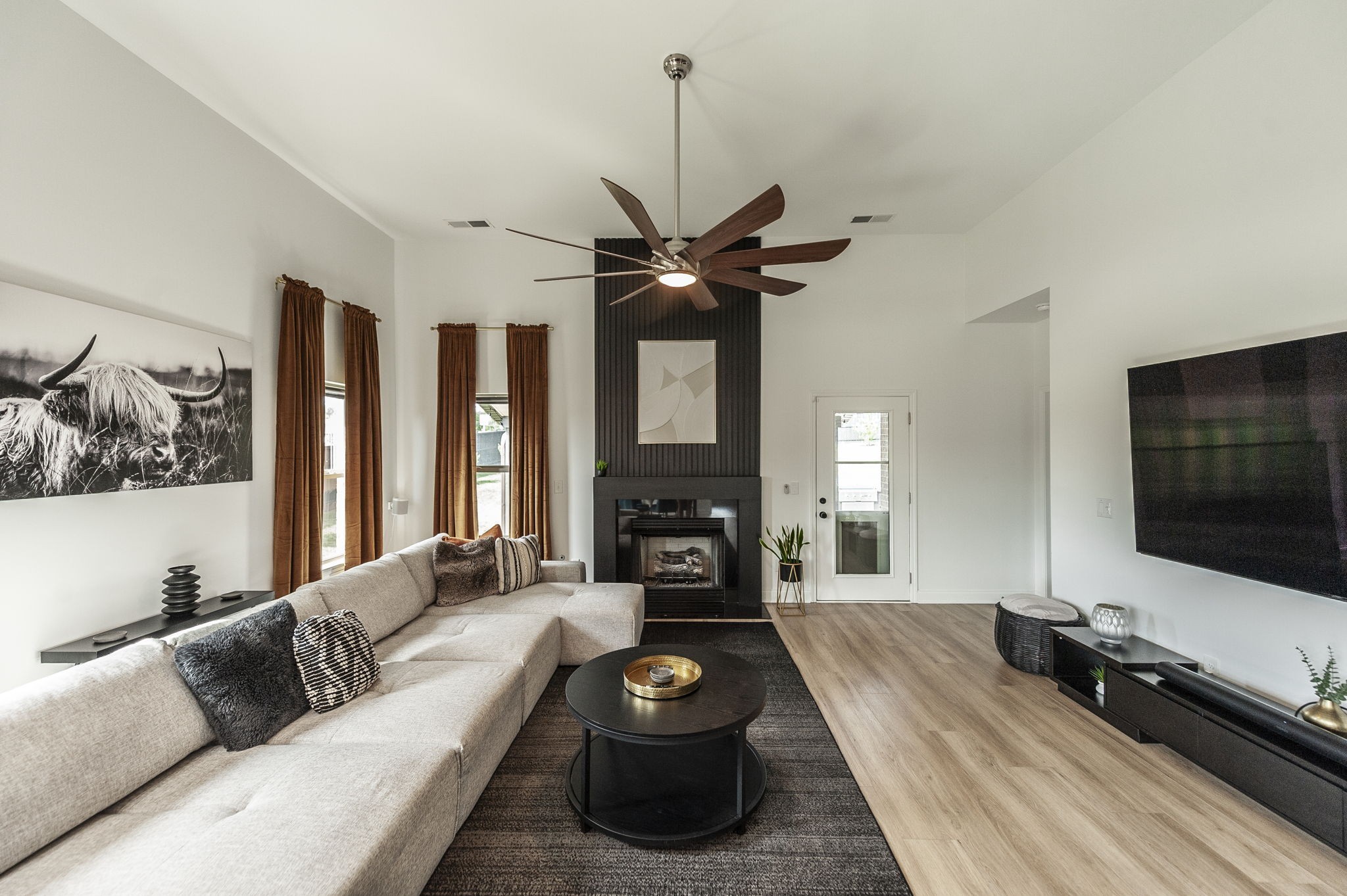 400 Quarry Road Gallatin, TN 37066 - Photo 32 of 81 a living room with furniture fireplace and flat screen tv