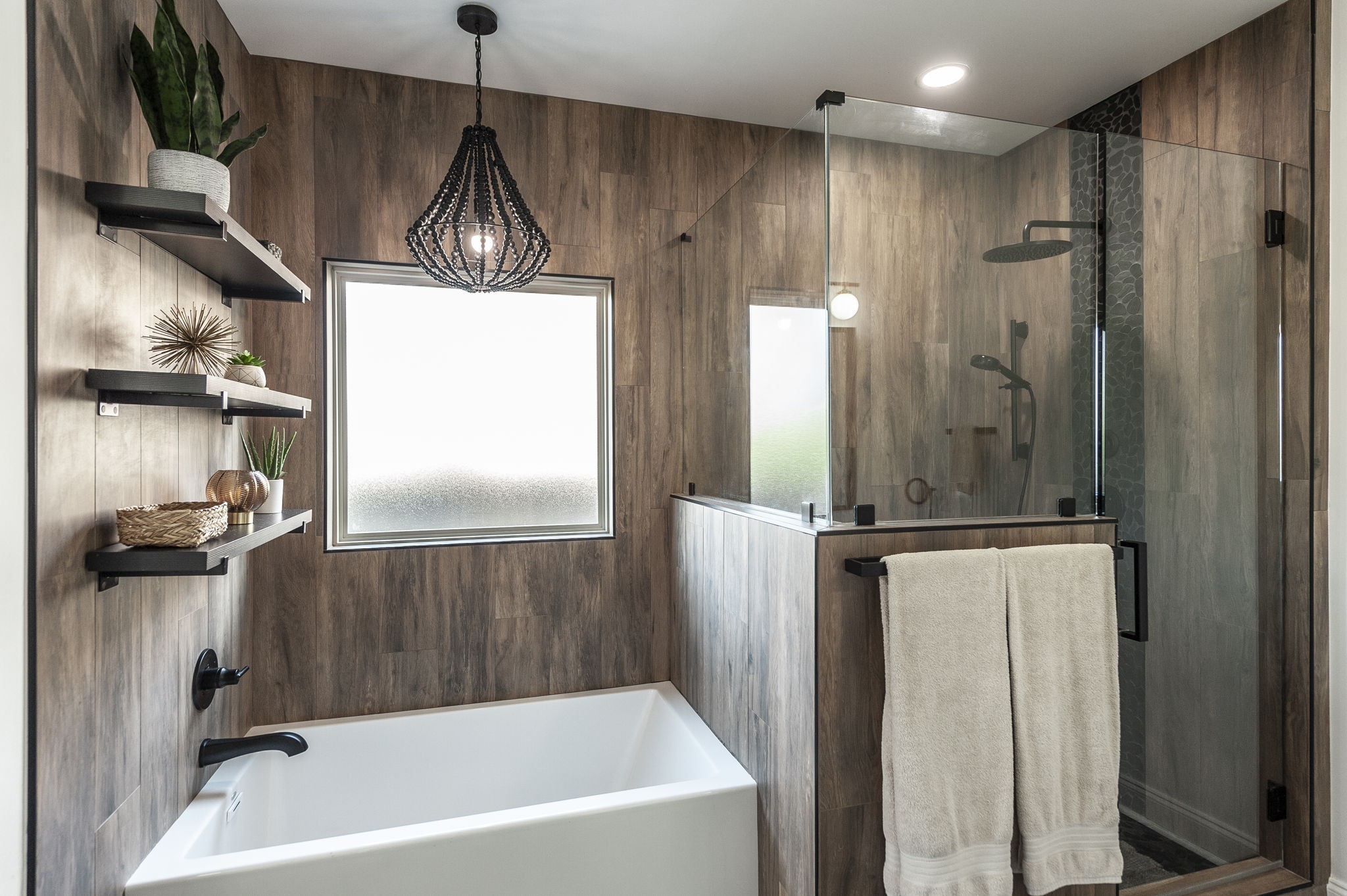 400 Quarry Road Gallatin, TN 37066 - Photo 41 of 81 a bathroom with a bathtub a sink a window and a shower