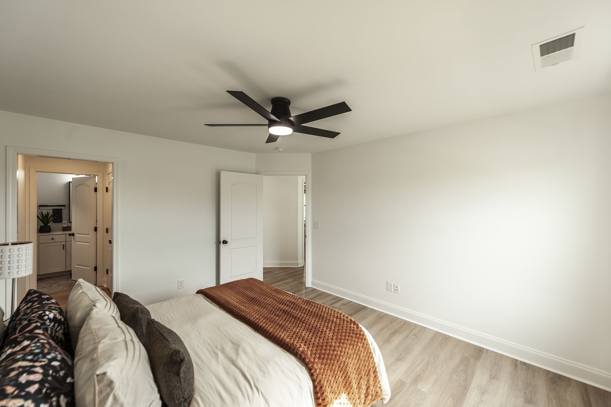 400 Quarry Road Gallatin, TN 37066 - Photo 49 of 81 a bedroom with a bed and a ceiling fan