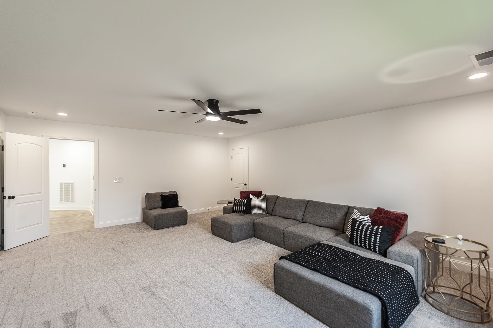 400 Quarry Road Gallatin, TN 37066 - Photo 59 of 81 a living room with a couch and a ceiling fan