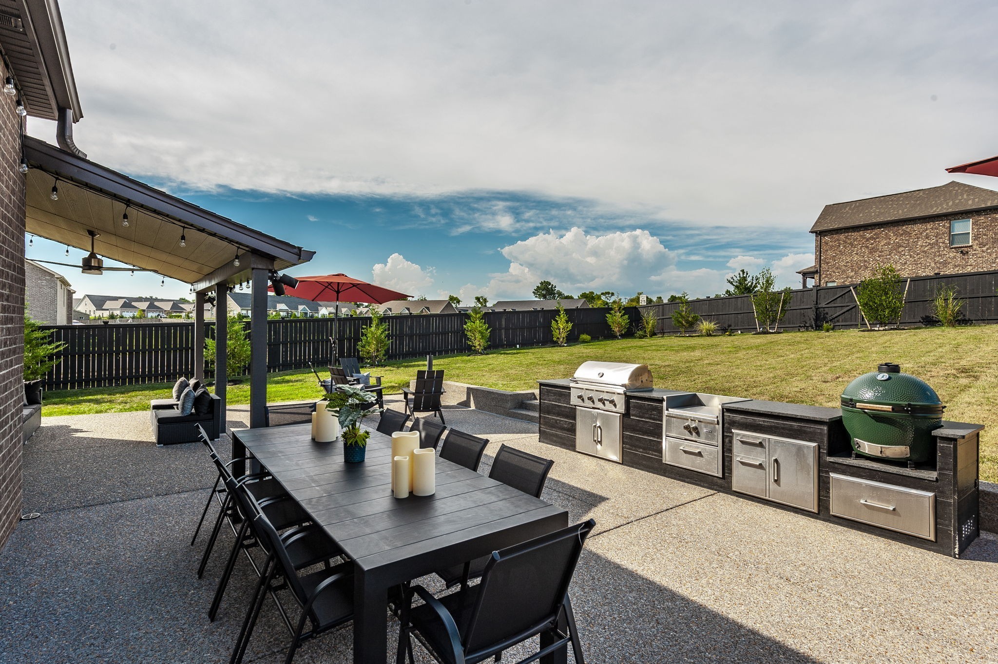 400 Quarry Road Gallatin, TN 37066 - Photo 67 of 81 a view of a patio with a dining table and chairs