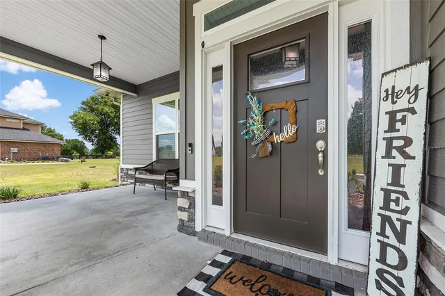 a view of a entryway door front of house