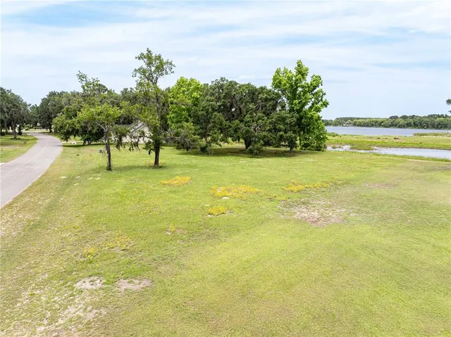 a view of an swimming pool and a yard