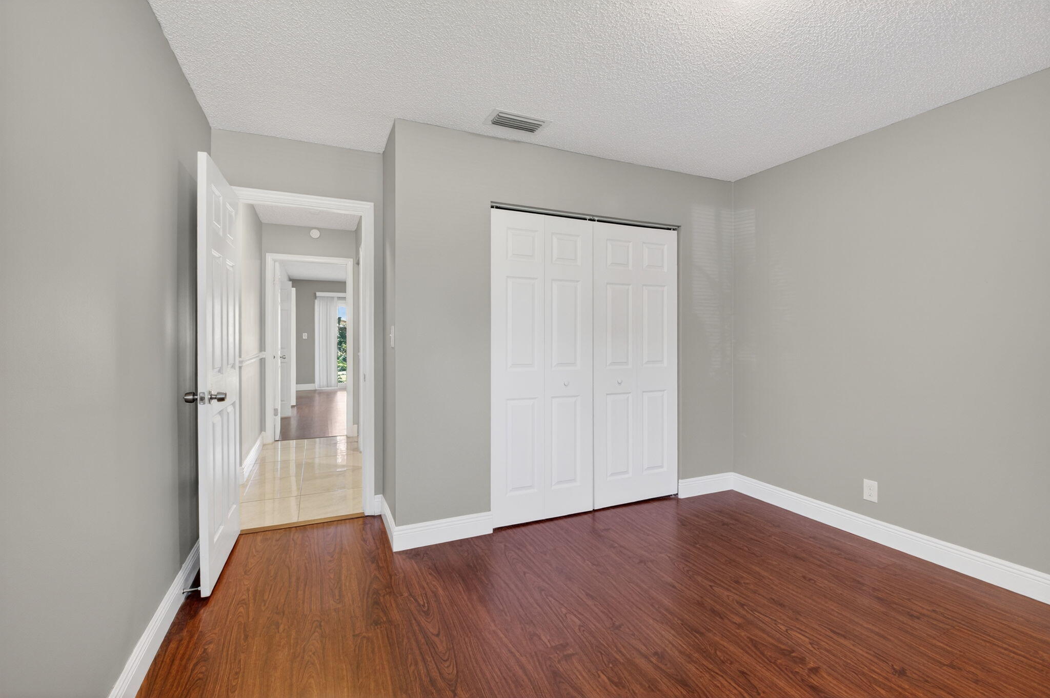 18093 104th Terrace South Boca Raton, FL 33498 - Photo 14 of 43 a view of a room with wooden floor