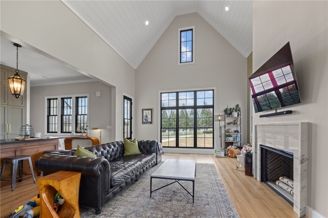 677 Lightwood Road Hartwell, GA 30643 - Photo 8 of 42 This expansive living area features soaring ceilings and abundant natural light.