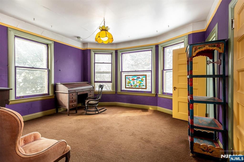 20 Prospect Terrace Montclair, NJ 07042 - Photo 37 of 49 a view of a workspace with furniture and a window