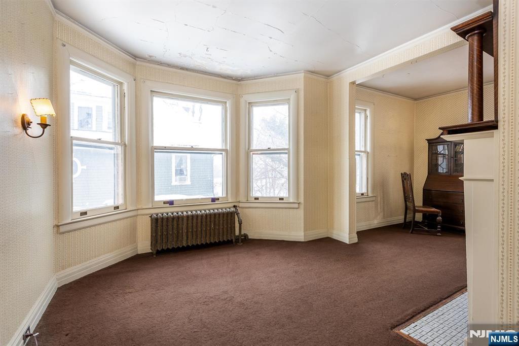 20 Prospect Terrace Montclair, NJ 07042 - Photo 41 of 49 a spacious bedroom with a bed and a large window
