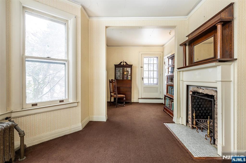 20 Prospect Terrace Montclair, NJ 07042 - Photo 42 of 49 a view of a livingroom with a fireplace and window