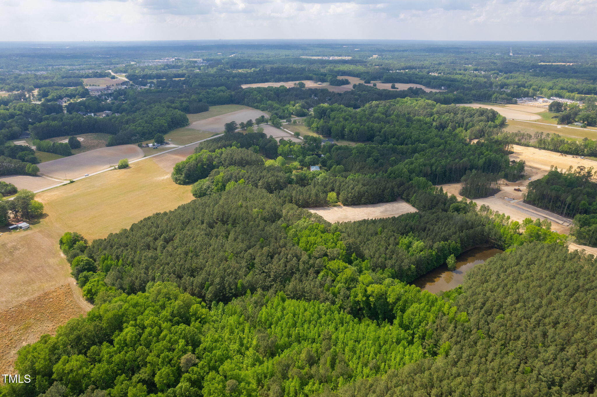 1753 Eagle Rock Road Wendell, NC 27591 - Photo 11 of 29 a view of a lake with a city