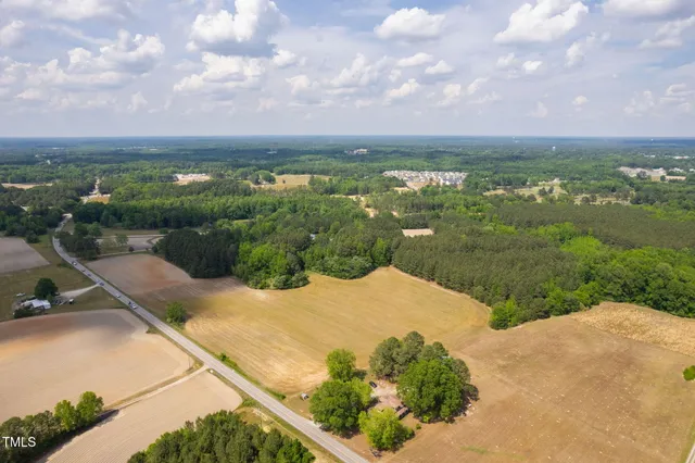 a view of a lake with a yard