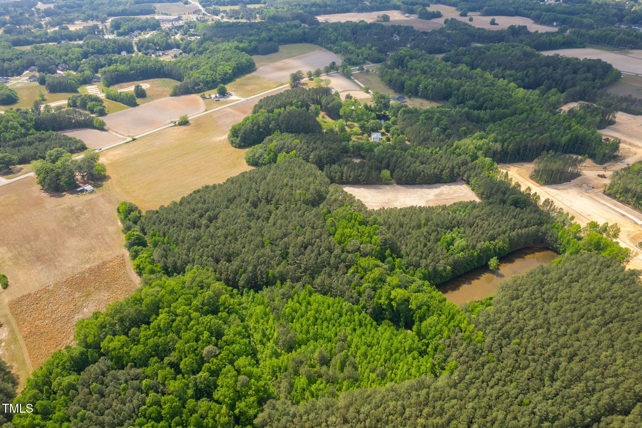 1753 Eagle Rock Road Wendell, NC 27591 - Photo 26 of 29 a view of a garden with a lake