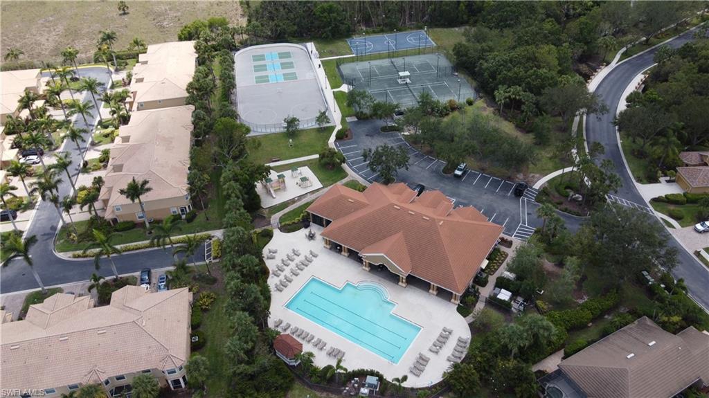 9801 Foxhall Way, Unit 5 Estero, FL 33928 - Photo 25 of 26 an aerial view of a house with outdoor space and a lake view
