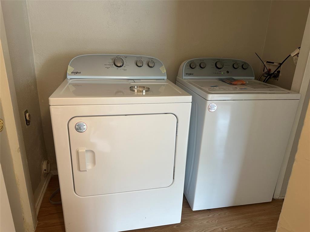 3121 Park Lane, Unit 1147 Dallas, TX 75220 - Photo 16 of 22 a utility room with dryer and washer