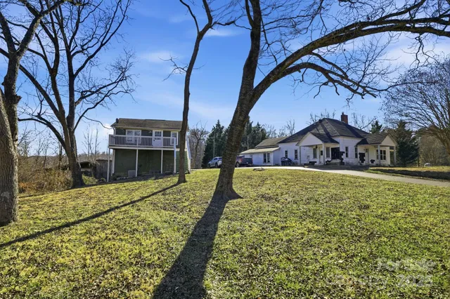 a view of house with outdoor space
