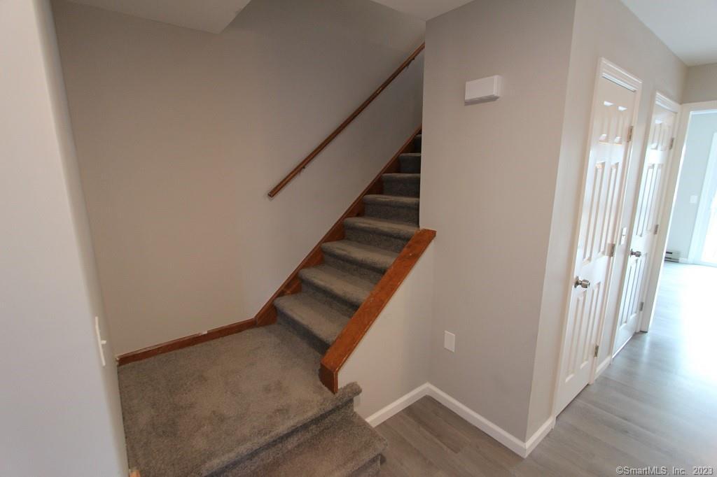1400 Meriden Road, Unit 52 Waterbury, CT 06705 - Photo 11 of 21 a view of entryway with stairs