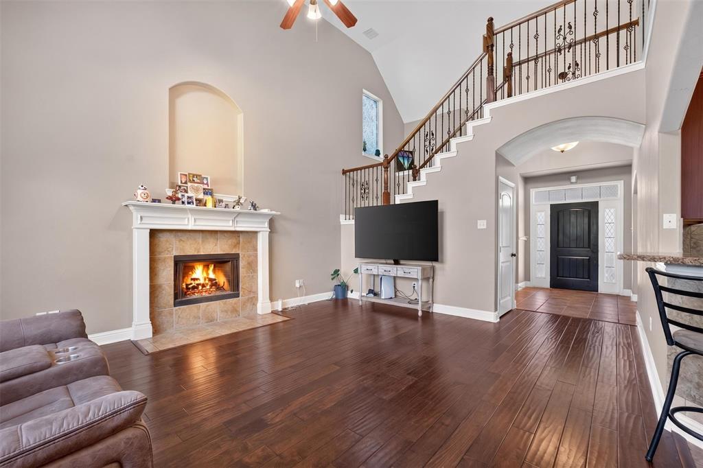 517 Austin Acre Road Sulphur Springs, TX 75482 - Photo 10 of 23 a living room with furniture and a fireplace