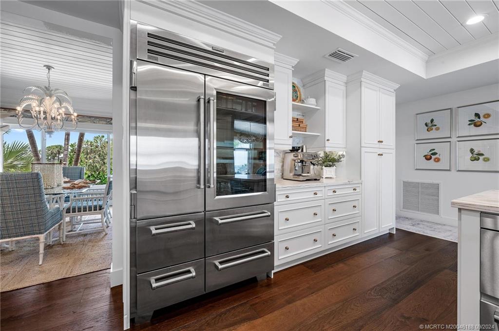 4110 Northeast Joes Point Road Stuart, FL 34996 - Photo 30 of 67 a kitchen with granite countertop a refrigerator and a stove