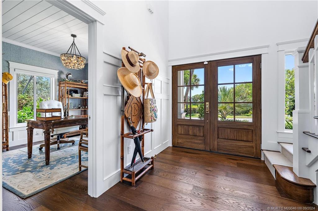 4110 Northeast Joes Point Road Stuart, FL 34996 - Photo 41 of 67 a very nice looking room with a large window and a rug