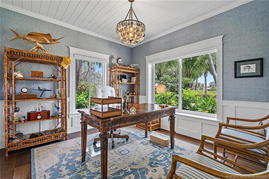 4110 Northeast Joes Point Road Stuart, FL 34996 - Photo 42 of 67 a workspace with furniture and a window