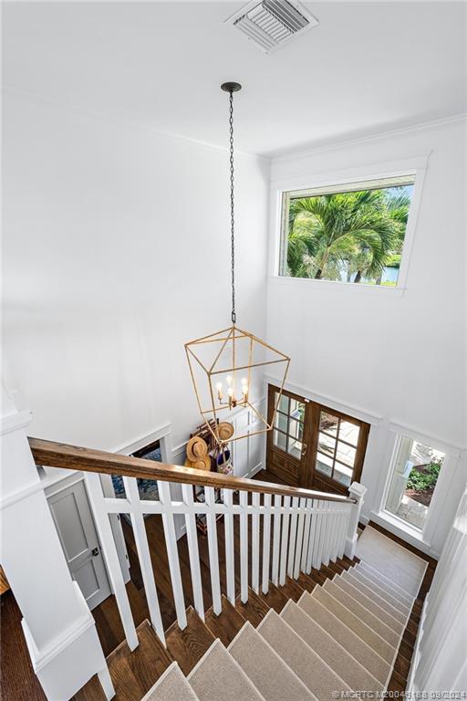 4110 Northeast Joes Point Road Stuart, FL 34996 - Photo 44 of 67 a view of a hallway with wooden floor