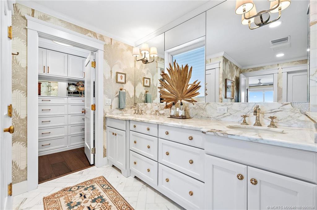 4110 Northeast Joes Point Road Stuart, FL 34996 - Photo 54 of 67 a bathroom with a granite countertop sink mirror and