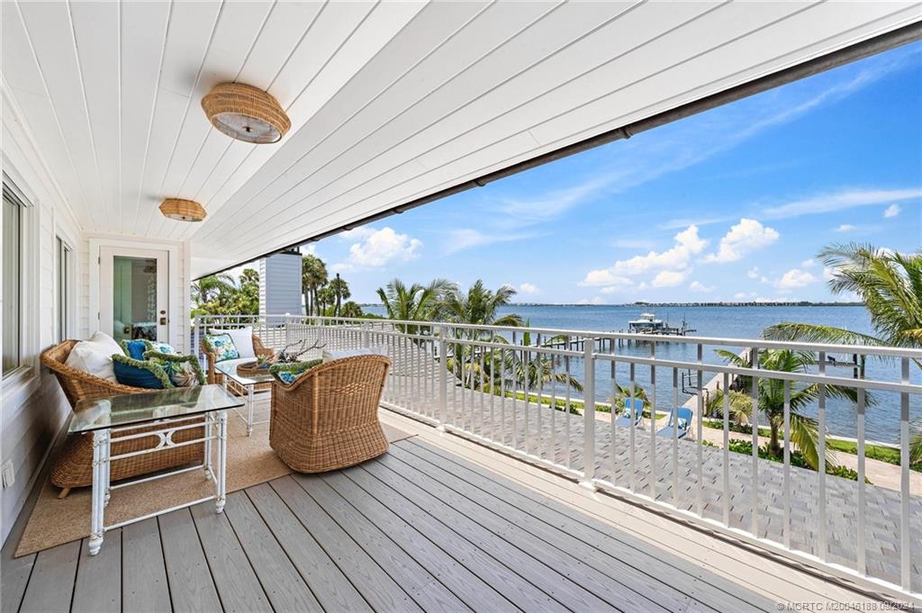 4110 Northeast Joes Point Road Stuart, FL 34996 - Photo 55 of 67 a balcony with furniture and city view
