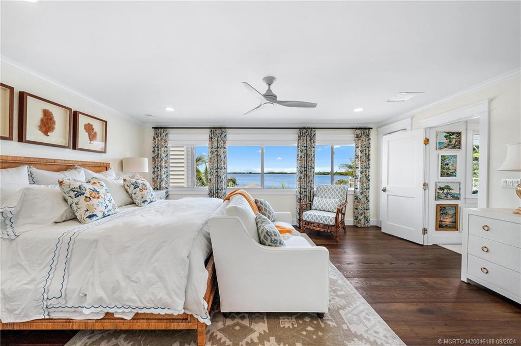 4110 Northeast Joes Point Road Stuart, FL 34996 - Photo 59 of 67 a bedroom with a large bed and a view of bedroom