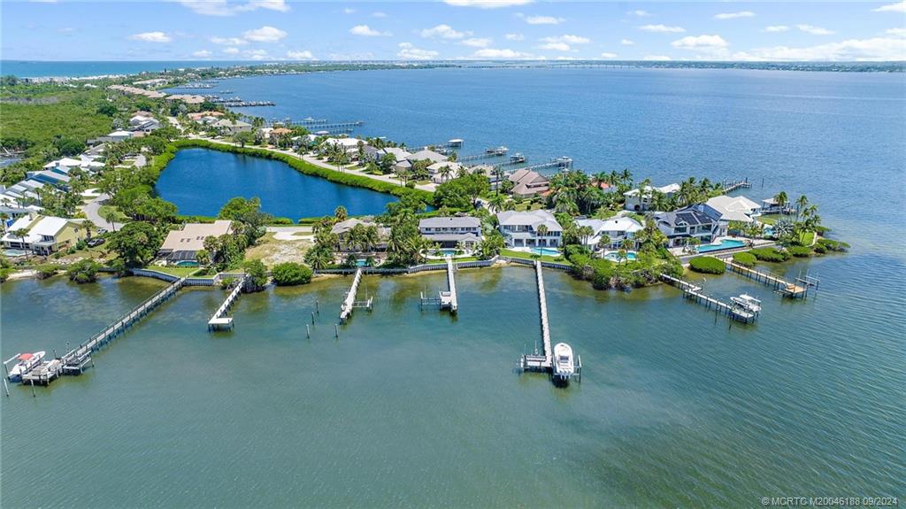 4110 Northeast Joes Point Road Stuart, FL 34996 - Photo 62 of 67 a view of a balcony with chairs
