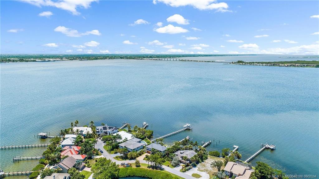 4110 Northeast Joes Point Road Stuart, FL 34996 - Photo 63 of 67 a view of a lake and a yard