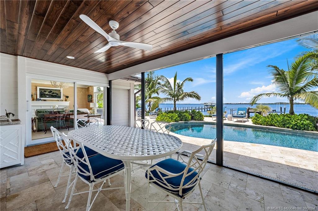 4110 Northeast Joes Point Road Stuart, FL 34996 - Photo 10 of 67 a view of an outdoor dining space with a patio