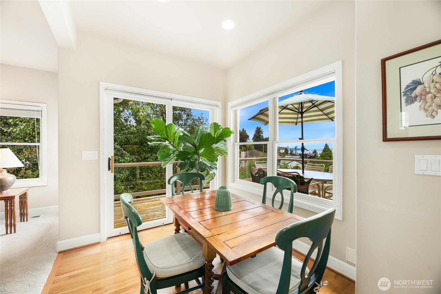 621 Southwest 295th Place Federal Way, WA 98023 - Photo 17 of 35 a view of a dining room with furniture and wooden floor