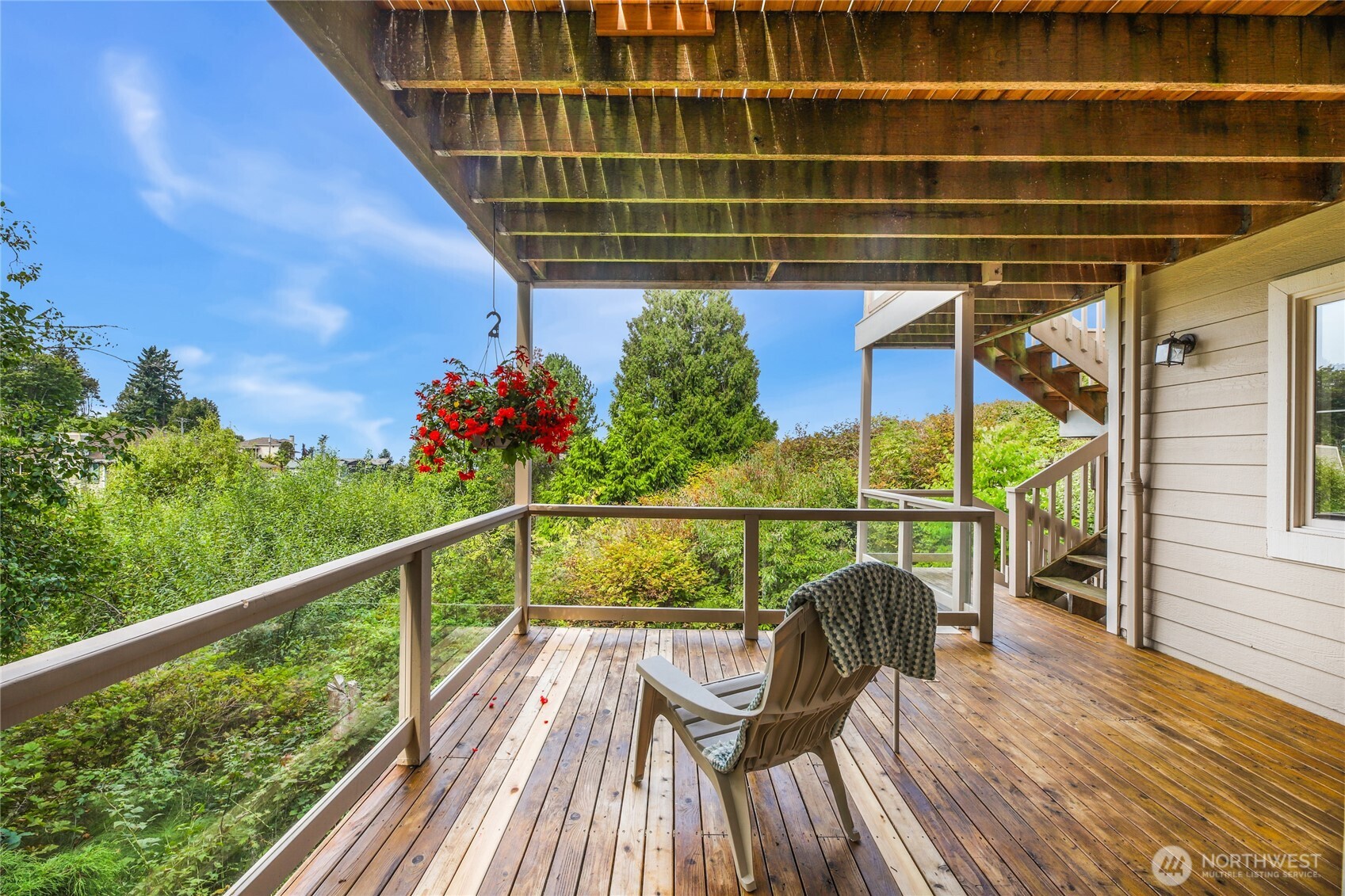 621 Southwest 295th Place Federal Way, WA 98023 - Photo 34 of 35 a view of a balcony with wooden floor and outdoor seating