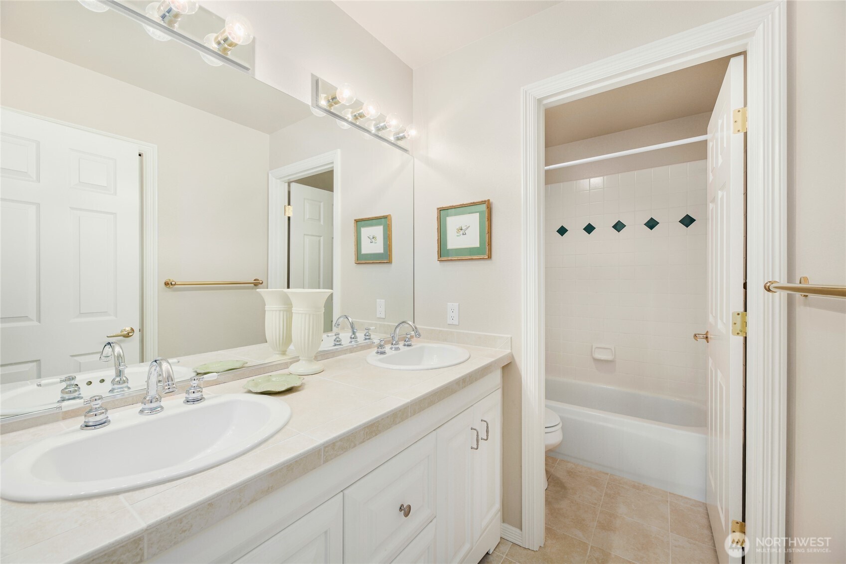 621 Southwest 295th Place Federal Way, WA 98023 - Photo 35 of 35 a bathroom with a double vanity sink mirror and bathtub