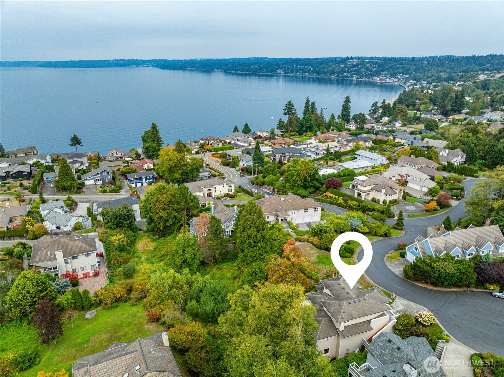 621 Southwest 295th Place Federal Way, WA 98023 - Photo 5 of 35 an aerial view of a house with a swimming pool outdoor seating and mountain view in back