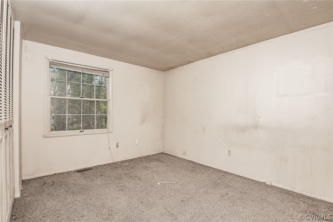 9333 Carbe Road North Chesterfield, VA 23236 - Photo 17 of 34 an empty room with a window