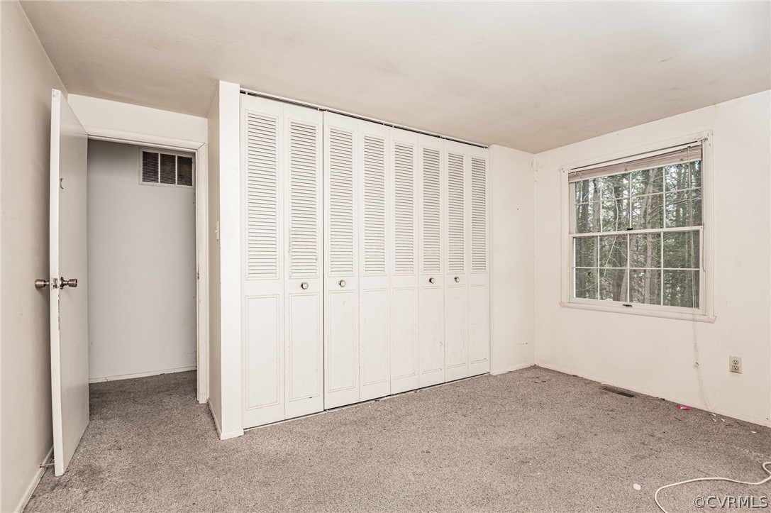 9333 Carbe Road North Chesterfield, VA 23236 - Photo 18 of 34 an empty room with windows