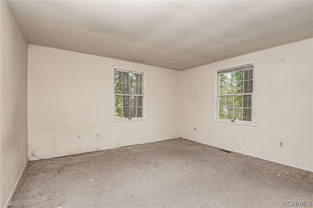 9333 Carbe Road North Chesterfield, VA 23236 - Photo 19 of 34 an empty room with windows